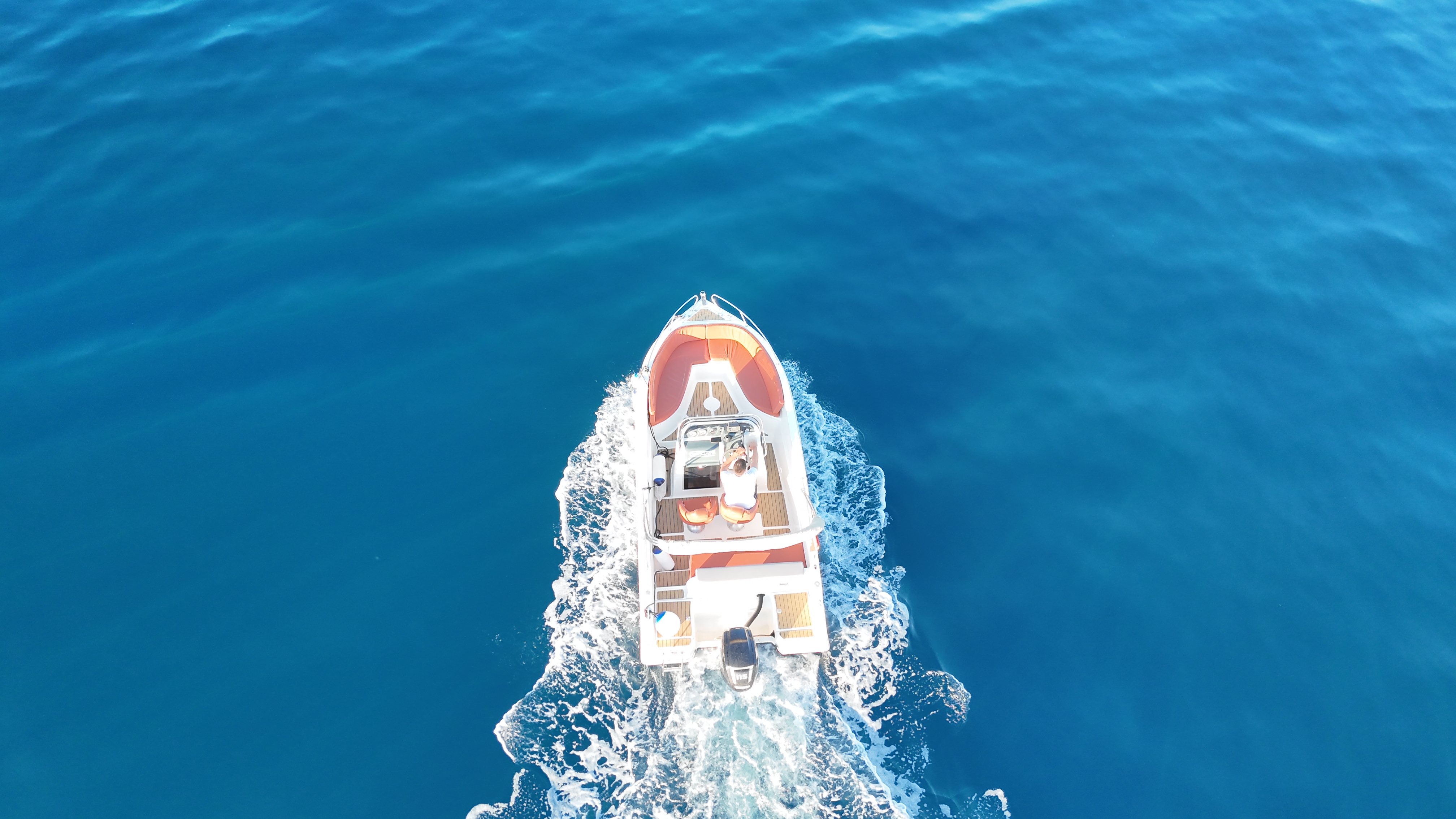 Boat in crystal clear bay